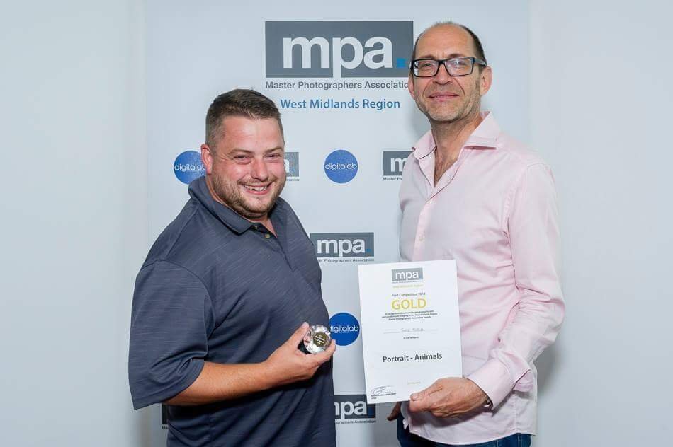 Jamie Morgan LMPA and Richard Bradbury FMPA Photographed receiving the Gold Award in the MPA Regional Print Competition.